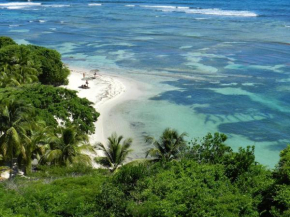 Anse des Rochers studio accès au Lagon